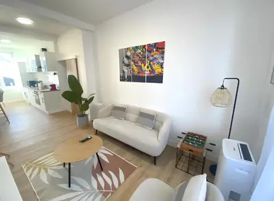 Coin salon dans l'établissement Coeur de ville - Appartement 2 chambres