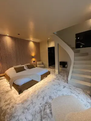 Un ou plusieurs lits dans un hébergement de l'établissement Cosy Room & SAUNA Hypercentre Dieppe
