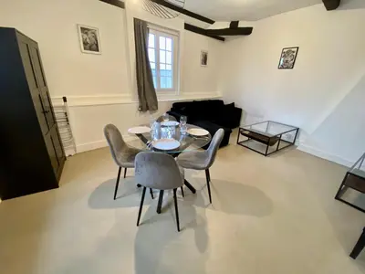Coin salon dans l'établissement Henry II - Petit appartement lumineux - 013