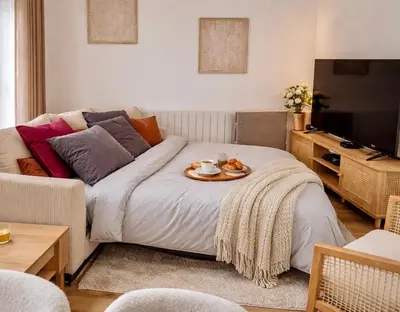 Télévision ou salle de divertissement dans l'établissement Appartement confortable et élégant en centre ville