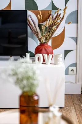 Télévision ou salle de divertissement dans l'établissement Le Cocon sous les toits