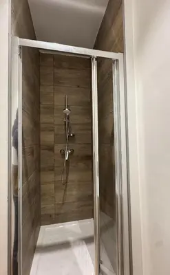 Salle de bains dans l'établissement L'Olivier RDC