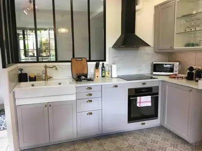 Cuisine ou kitchenette dans l'établissement Gîte La Maisonnette à Auvers-sur-Oise