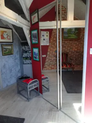 Coin salon dans l'établissement La Roseraie du Prieure