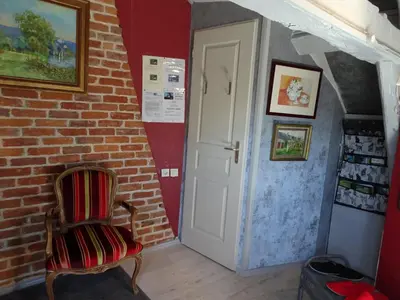 Coin salon dans l'établissement La Roseraie du Prieure