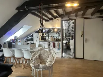 Coin salon dans l'établissement Appartement dans la Résidence le Chateaux