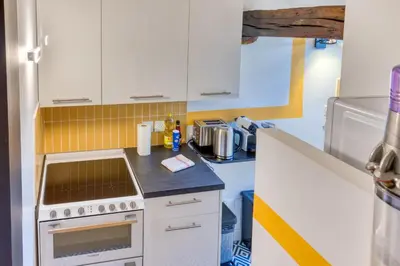 Cuisine ou kitchenette dans l'établissement Esmée votre appartement rénové en hyper-centre