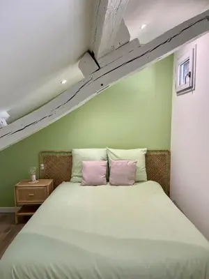 Un ou plusieurs lits dans un hébergement de l'établissement La Rose de Vert