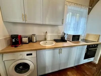 Cuisine ou kitchenette dans l'établissement Le Bleuet de Rouen