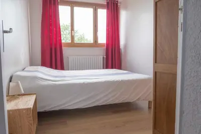 Un ou plusieurs lits dans un hébergement de l'établissement Villa des champs