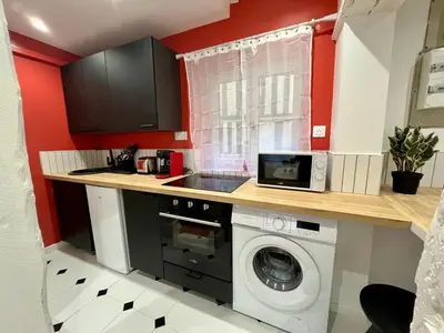 Cuisine ou kitchenette dans l'établissement l'Hibiscus