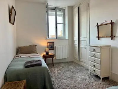 Un ou plusieurs lits dans un hébergement de l'établissement Hôtel Particulier Petit-Decaix