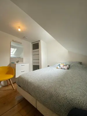 Un ou plusieurs lits dans un hébergement de l'établissement Duplex quartier calme et parking gratuit