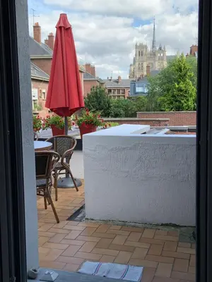 Balcon ou terrasse dans l'établissement Terrasse vue cathédrale et beffroi hyper centre