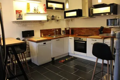 Cuisine ou kitchenette dans l'établissement Les Embruns