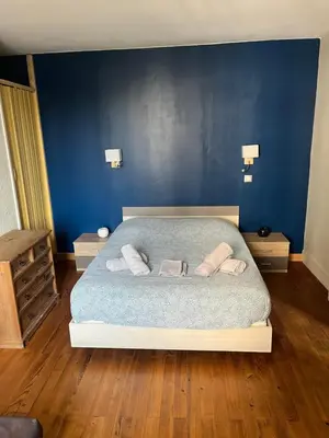 Un ou plusieurs lits dans un hébergement de l'établissement Appartement Cosy entre port et plage