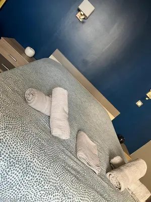 Un ou plusieurs lits dans un hébergement de l'établissement Appartement Cosy entre port et plage