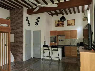 Cuisine ou kitchenette dans l'établissement L'escapade en mezzanine