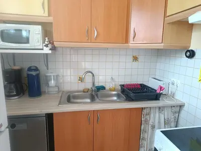 Cuisine ou kitchenette dans l'établissement appartement, résidence centre ville, Le Tréport