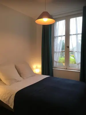 Un ou plusieurs lits dans un hébergement de l'établissement Villa des glycines et Spa nordique à 1h30 de Paris
