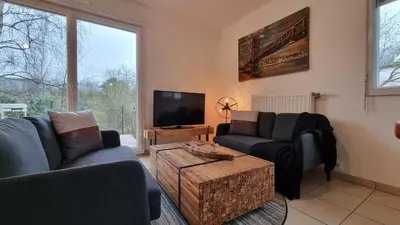 Télévision ou salle de divertissement dans l'établissement Bel appartement à seulement 30 minutes de Paris-la défense