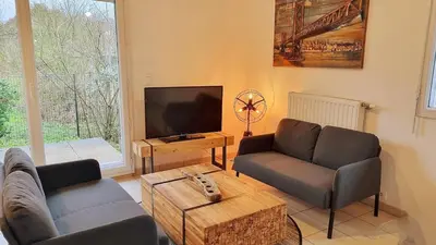 Télévision ou salle de divertissement dans l'établissement Bel appartement à seulement 30 minutes de Paris-la défense