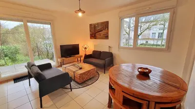 Coin salon dans l'établissement Bel appartement à seulement 30 minutes de Paris-la défense