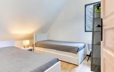 Un ou plusieurs lits dans un hébergement de l'établissement Nice Home In Venon With Wifi