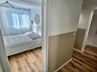 Un ou plusieurs lits dans un hébergement de l'établissement Maisonette Cozy, Neuf, Centre-ville, Wifi