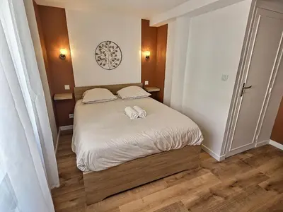 Un ou plusieurs lits dans un hébergement de l'établissement Maisonette Cozy, Neuf, Centre-ville, Wifi