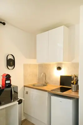 Cuisine ou kitchenette dans l'établissement Le Lounge - studio en Hypercentre