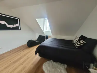 Un ou plusieurs lits dans un hébergement de l'établissement Loveroom Instants Secret Amiens