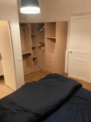 Un ou plusieurs lits dans un hébergement de l'établissement Appartement agréable et fonctionnel