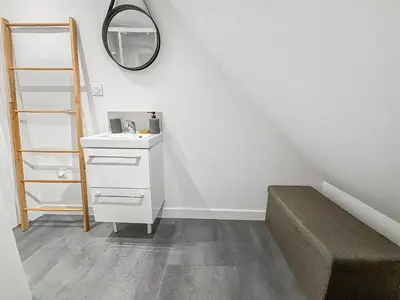 Cuisine ou kitchenette dans l'établissement Maison cosy rénovée et lumineuse