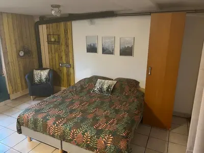 Un ou plusieurs lits dans un hébergement de l'établissement Studio le petit Bouclet
