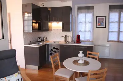 Cuisine ou kitchenette dans l'établissement Petit Vitet