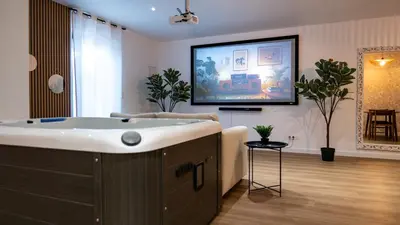 Télévision ou salle de divertissement dans l'établissement Comme chez soi - Amiens