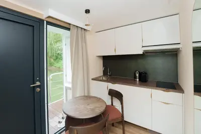 Cuisine ou kitchenette dans l'établissement L'Escale Royale Poissy Île de Migneaux - Seine