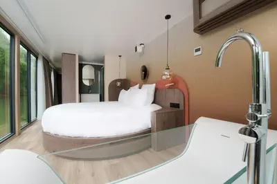 Un ou plusieurs lits dans un hébergement de l'établissement L'Escale Royale Poissy Île de Migneaux - Seine