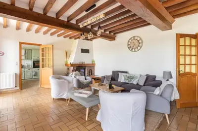 Coin salon dans l'établissement Le gîte du Papillon - Normandy Holiday Cottage