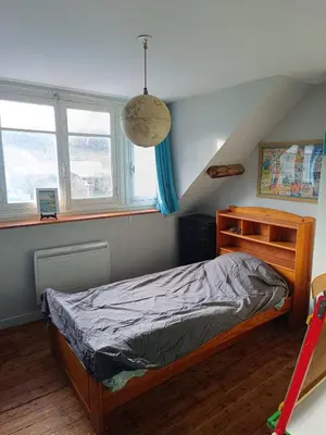 Un ou plusieurs lits dans un hébergement de l'établissement Cozy house