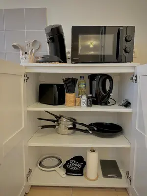 Cuisine ou kitchenette dans l'établissement Appartement L Escale à Tillé