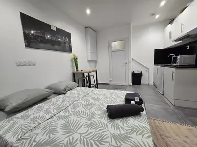 Cuisine ou kitchenette dans l'établissement STUDIO COSY Meulan En Yveline