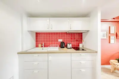 Cuisine ou kitchenette dans l'établissement Terracotta