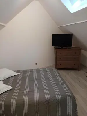Un ou plusieurs lits dans un hébergement de l'établissement Maison neuve 2 chambres