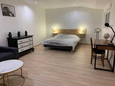 Un ou plusieurs lits dans un hébergement de l'établissement Chambre privée et cuisine commune
