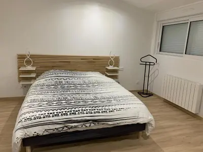 Un ou plusieurs lits dans un hébergement de l'établissement Chambre privée et cuisine commune