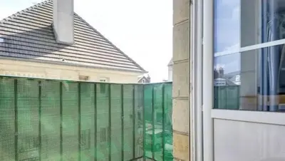 Balcon ou terrasse dans l'établissement Chambre chez l'habitant dans T4 hyper proche de la gare SNCF et à 300m de la gare routière