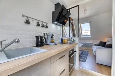 Cuisine ou kitchenette dans l'établissement Appartement dans l'hypercentre de Rouen