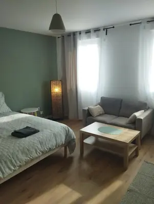 Un ou plusieurs lits dans un hébergement de l'établissement Appartement Cosy proche de Rouen